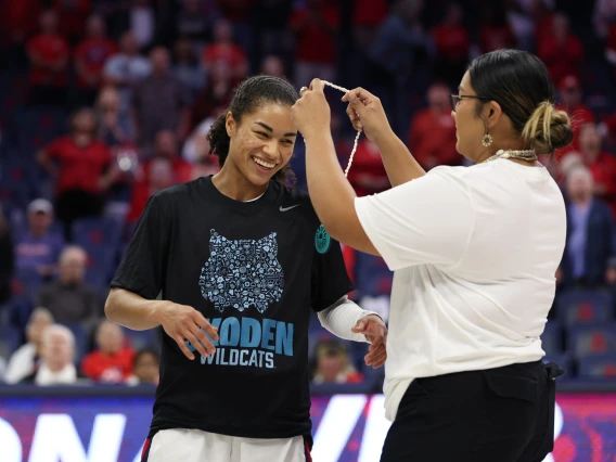 Noelani receiving Tohono O'odham Necklace from Tori Johnson